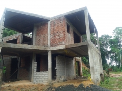 Land and Partially Build house